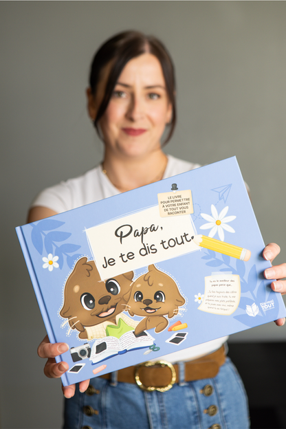 livre papa je te dis tout dans les mains